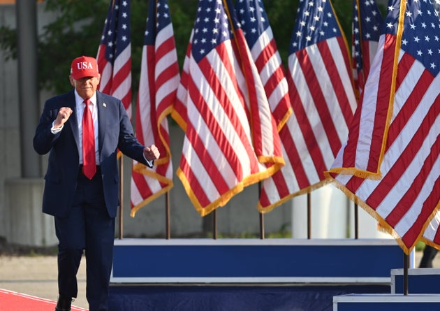 President Donald Trump arrives and gestures to the crowd at an America250 rally in Des Moines, Iowa, on Thursday. 