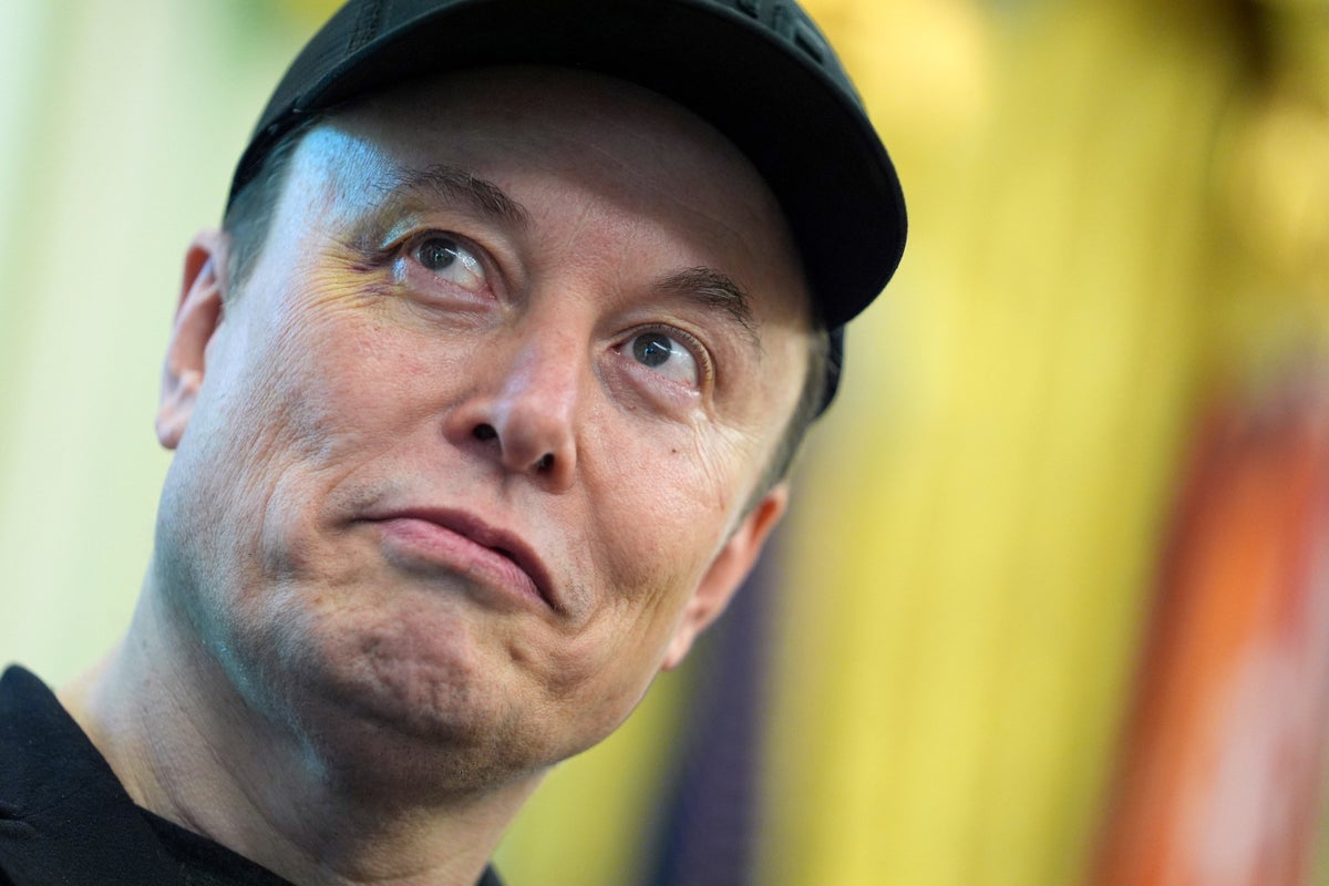 Elon Musk listens as President Donald Trump speaks during a news conference in the Oval Office of the White House, Friday, May 30, 2025, in Washington. (AP Photo/Evan Vucci)