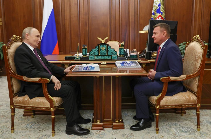 Russian President Vladimir Putin, left, meets with former Russian Transport Minister Roman Starovoit at the Kremlin in Moscow, Russia, on Thursday, Jan. 30, 2025. 
