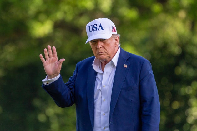 President Donald Trump walks on the south lawn of the White House on Sunday in Washington, D.C. 