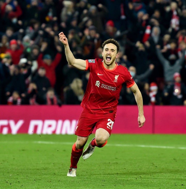 LIVERPOOL, ENGLAND - DECEMBER 22: Diogo Jota of Liverpool celebrates after scoring the winning goal from the spot during the Carabao Cup Quarter Final match between Liverpool and Leicester City at Anfield on December 22, 2021 in Liverpool, England. (Photo by Andrew Powell/Liverpool FC via Getty Images)