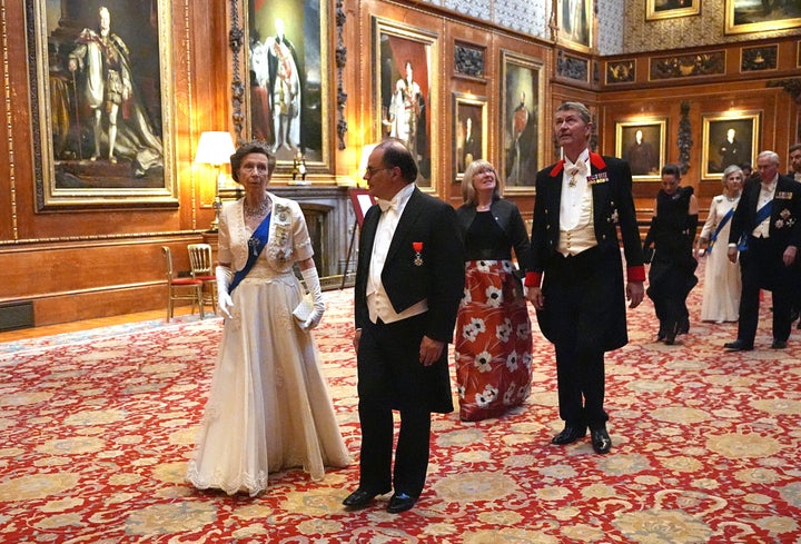 Princess Anne speaks with Secretary General of the French Presidency, Emmanuel Moulin. 