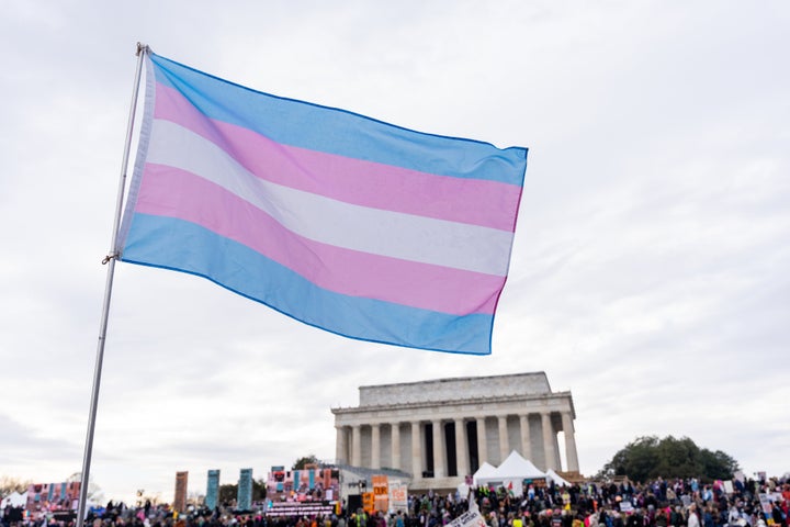 A transgender pride flag flies during the People's March and rally to the Lincoln Memorial in Washington, D.C., on Jan. 18.