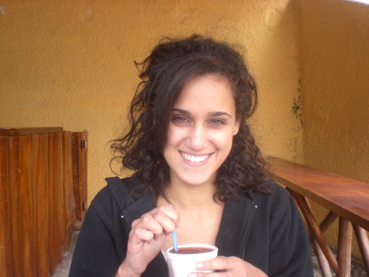 The author began wearing her hair curly while living abroad in Ecuador.