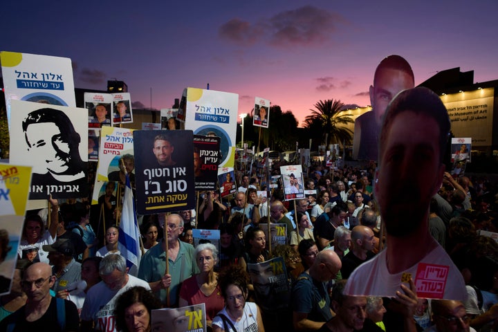 Relatives and supporters of Israeli hostages held in the Gaza Strip attend a rally demanding their release from Hamas captivity and calling for an end to the war, in Tel Aviv, Israel, Saturday, July 12, 2025. (AP Photo/Oded Balilty)