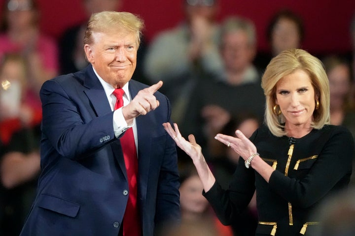 Fox News presenter Laura Ingraham appears with Trump during an electoral town hall in February 2024.