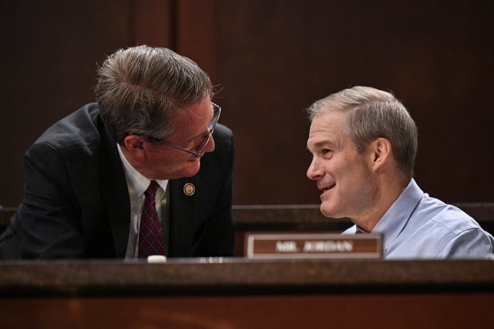 Rep. Tim Burchett (R-Tenn.) speaks with Rep. Jim Jordan (R-Ohio) during a House Oversight and Government Reform Committee hearing on public broadcasting services on Capitol Hill in Washington, D.C., on March 26.