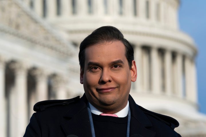 Then-Rep. George Santos, R-N.Y., faces reporters at the Capitol in Washington, early Thursday, Nov. 30, 2023. (AP Photo/J. Scott Applewhite)