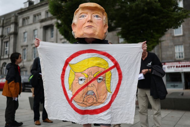 Demonstrators gather at Union Terrace protesting against the visit of President Trump to Scotland on July 26, 2025 in Aberdeen, Scotland. 