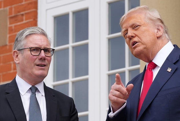 President Donald Trump meets with Britain's Prime Minister Keir Starmer, left, at Trump Turnberry golf club on Monday, July 28, 2025 in Turnberry, Scotland. (Christopher Furlong/Pool Photo via AP)