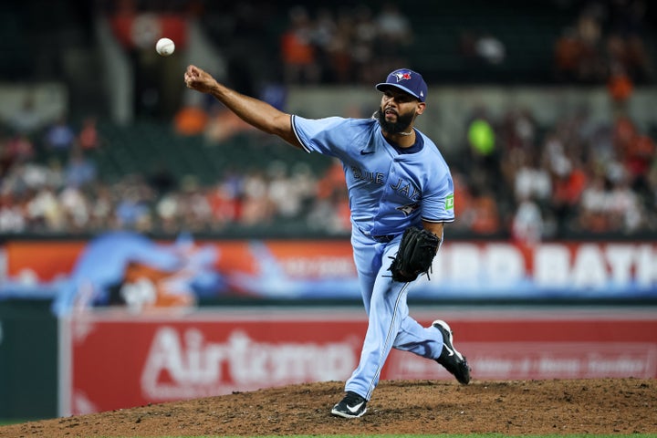 Seranthony Dominguez of the Toronto Blue Jays pitches against the Baltimore Orioles in the second game of a doubleheader after Baltimore traded him to Toronto between games.