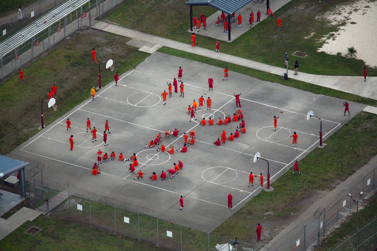 Men detained at Krome Detention Center in Florida gathered in the recreation yard and formed the letters "SOS" as allegations of inhumane conditions increased.