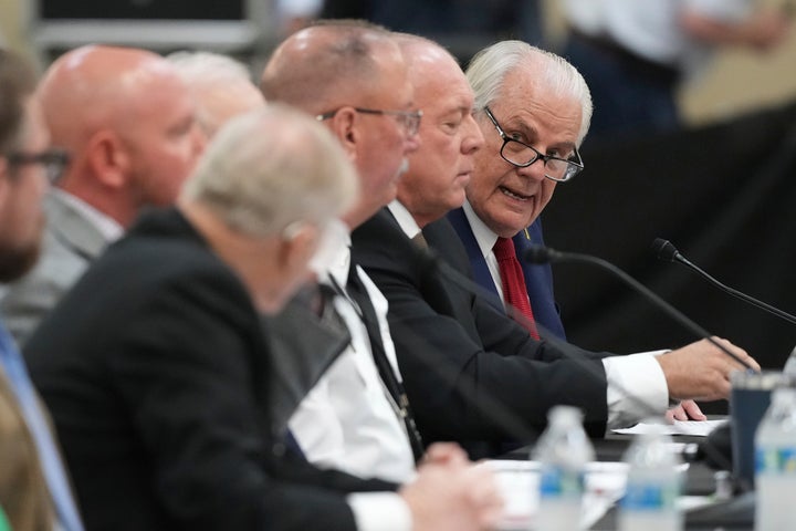 Kerr County Judge Rob Kelly, right, testifies during a Senate and House Select Committees on Disaster Preparedness and Flooding public hearing in Kerrville, Texas, Thursday, July 31, 2025.