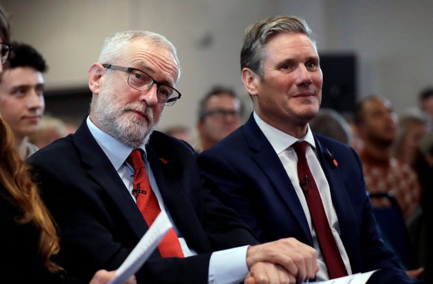 Former Labour party leader Jeremy Corbyn, left, sits waiting to speak next to Keir Starmer – then Labour's Shadow Secretary of State for Exiting the European Union – during their election campaign event on Brexit in Harlow, England, Tuesday, Nov. 5, 2019. 