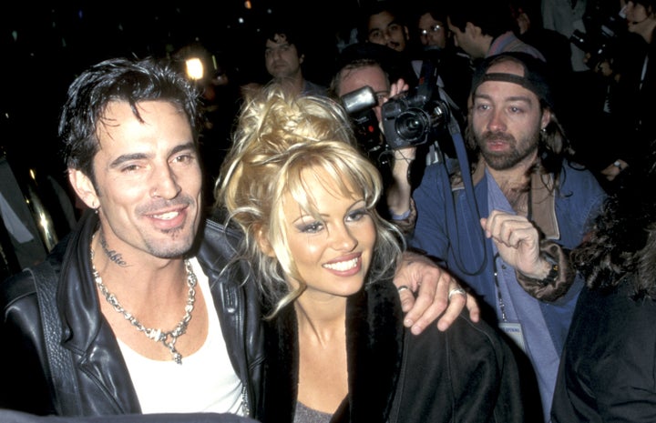 Anderson and her ex-husband Tommy Lee party at the Hard Rock Hotel & Casino Las Vegas grand opening in 1995.
