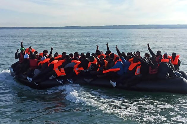 This photo provided by the Prefecture Maritime du Nord et de la Manche shows migrants continuing their journey to Britain off northern France coast, Tuesday, April 23, 2024. 