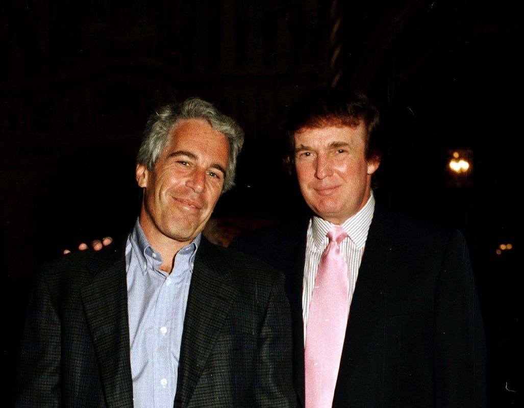 Portrait of American financier Jeffrey Epstein (left) and real estate developer Donald Trump as they pose together at the Mar-a-Lago estate, Palm Beach, Florida, 1997. (Photo by Davidoff Studios/Getty Images)