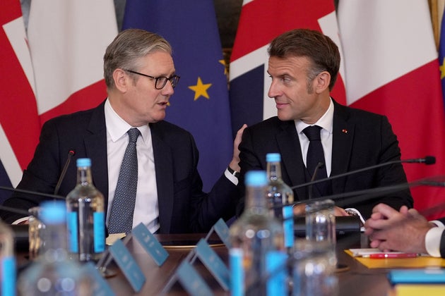 Britain's Prime Minister Keir Starmer, left, and French President Emmanuel Macron attend a plenary at the UK-France Summit in Downing Street, London Thursday, July 10, 2025.