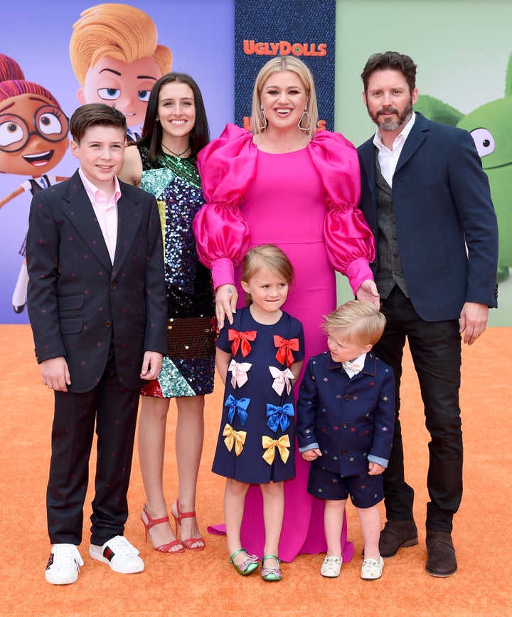 Kelly Clarksson, Brandon Blackstock, Savannah Blackstock, River Rose Blackstock, Remington Alexander Blackstock and Seth Blackstock attend the premiere of the premiere of the premiere of the premiere 