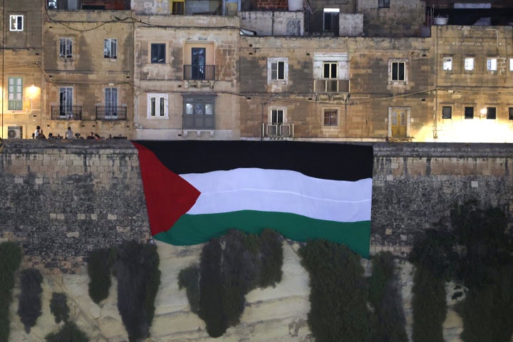 A Palestinian flag is displayed on a Senglea fortification during the UEFA Europa League's third qualifying round, in a soccer match between Hamrun Spartans FC and Maccabi Tel Aviv FC at the Tony Bezzina Stadium in Paola, Malta, on Aug. 5, 2025.