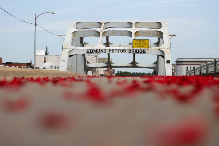 Flower petals lie on the Edmund Pettus Bridge ahead of Rep. John Lewis' casket crossing during a memorial service for Lewis on July 26, 2020, in Selma, Alabama.