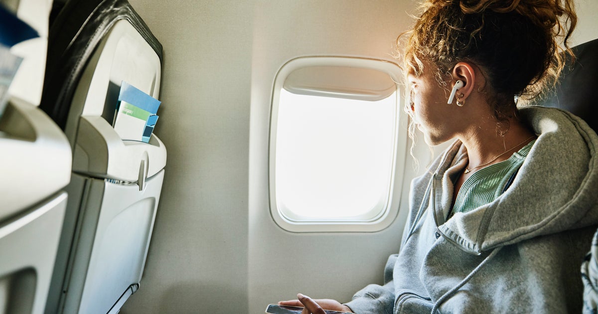 Image for article How To Calm Anxiety During Turbulence, According To Flight Attendants