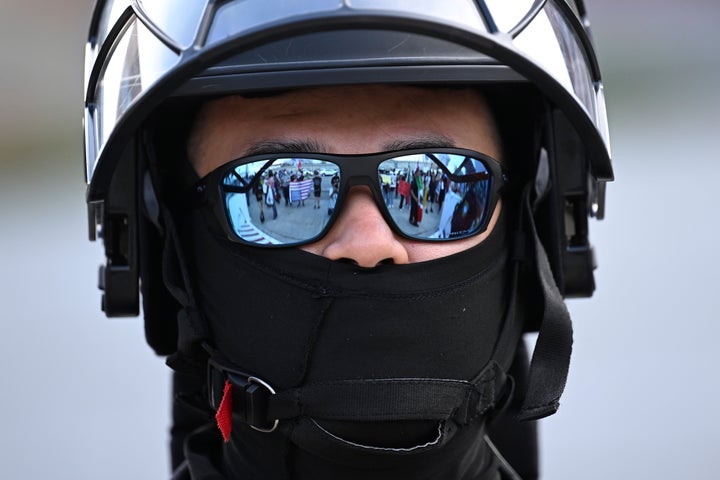Trump's New, Audacious Argument To The Courts 1 FILE - A U.S. Customs and Border Patrol agent looks on during a protest outside the Federal Building on June 13, 2025, in Los Angeles. (AP Photo/Wally Skalij, file)