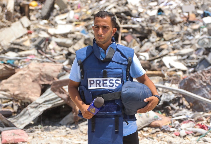 Al Jazeera correspondent Anas al-Sharif reports near the Arab Ahli (Baptist) Hospital in Gaza City on Oct. 10, 2024. Al-Sharif was killed in an Israeli airstrike on Aug. 11, 2025.