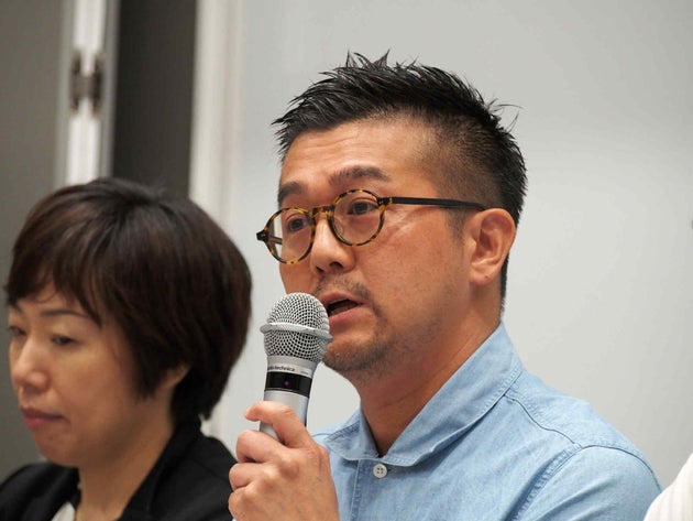 第2回シンポジウムで「一橋大学アウティング事件で変わった自分の人生」をテーマにスピーチする筆者