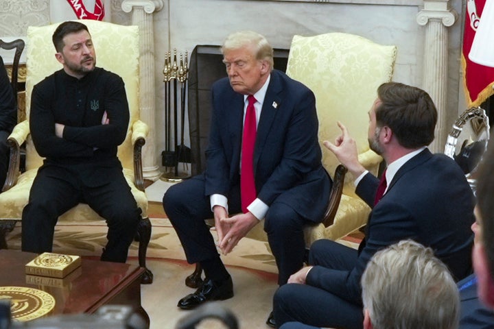 Vice President JD Vance, right, speaks with Ukrainian President Volodymyr Zelenskyy, left, as President Donald Trump listens, in the Oval Office at the White House, Feb. 28, 2025, in Washington. (AP Photo/ Mystyslav Chernov, File)