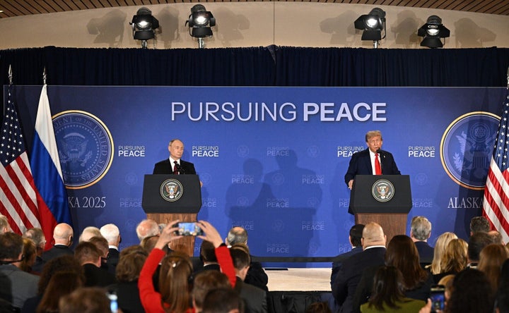 President Donald Trump and Vladimir Putin hold a joint press conference in Anchorage, Alaska, United States on August 15, 2025. (Photo by Kremlin Press Office/Anadolu via Getty Images)