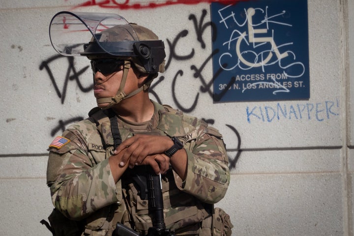 A California National Guard soldier stands guard outside of the federal building complex in downtown on June 17 in Los Angeles, California.