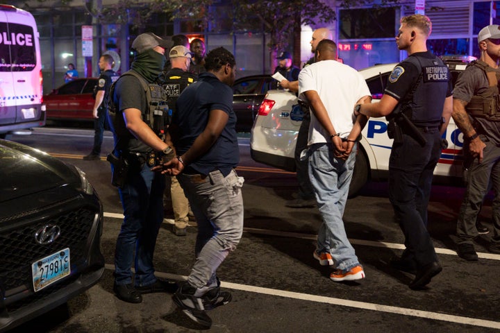 The members of the Federal Investigation Office (FBI), National Security Investigations (HSI), the Secret Service and the Metropolitan Police Department (MPD) stop five people in 7th Street NW on August 17, 2025 in Washington, DC. The president of the United States, Donald Trump, deployed federal officers and the National Guard in the District to place the DC Metropolitan Police Department under federal control and help in crime prevention in the capital of the nation.