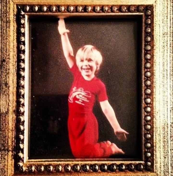 The author, age 5, doing gymnastics.