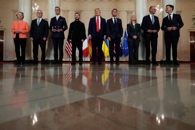 European Commission President Ursula von der Leyen, from left, British Prime Minister Keir Starmer, Finland's President Alexander Stubb, Ukrainian President Volodymyr Zelenskyy, President Donald Trump, France's President Emmanuel Macron, Italy's Prime Minister Giorgia Meloni, Germany's Chancellor Friedrich Merz and NATO Secretary General Mark Rutte pose for a group photo in the Grand Foyer of the White House, Monday, Aug. 18, 2025, in Washington.