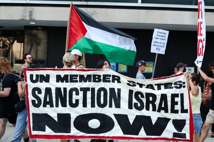 Protesters demonstrate outside the United Nations headquarters in New York City, where member states held a conference on pursuing a two-state solution for Israel and Palestine, on July 29, 2025. France had just days earlier announced it would formally recognize Palestinian statehood in September, provoking opposition from Israel and the United States.