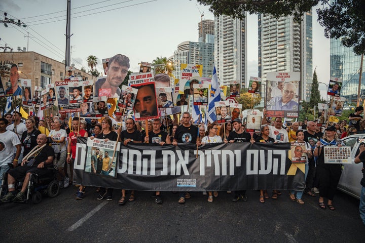 Israeli protesters march at a rally in Tel Aviv to demand the government agree to a hostage-ceasefire deal with Hamas, on Aug. 17, 2025. The demonstration was the largest held in Israel since Oct. 7, 2023.