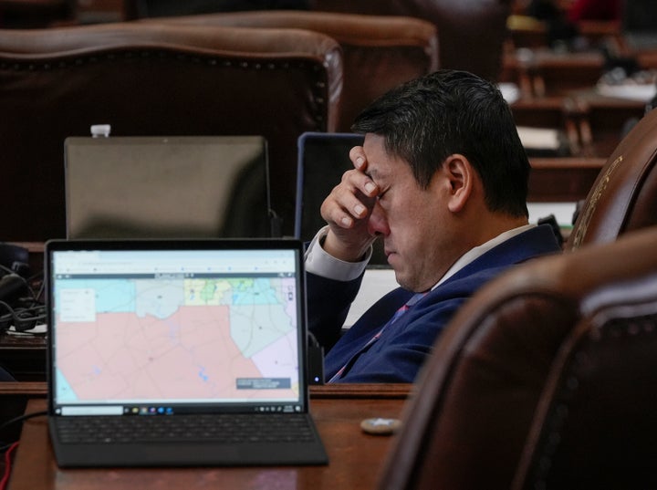 The representative Gene Wu (D-Houston) listens to the debate of a redistribution plan for Congress districts in the Capitol in Austin, on August 20.