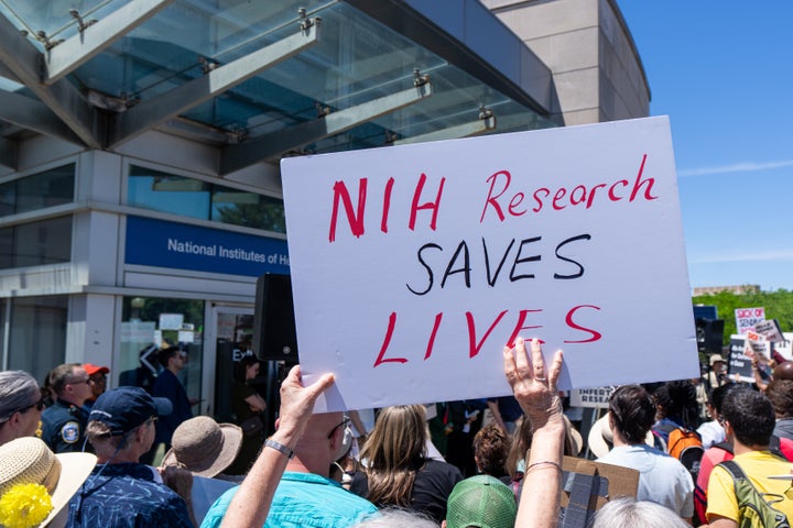 Justice Jackson Delivers Uncommon, Blistering Critique Of Conservative Justices Over Newest Supreme Courtroom Determination 1 Activists hold signs at a rally outside the National Institutes of Health in Bethesda, Maryland, on May 10.