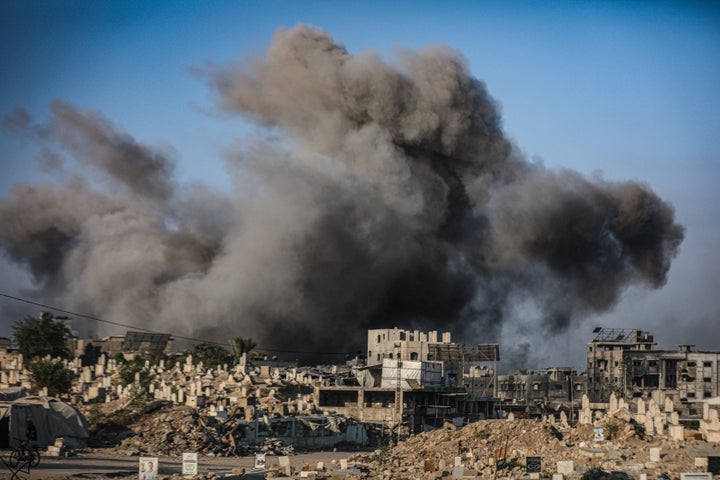 Smoke rises over residential buildings following the Israeli attack on ez-Zeytun and Sabra neighborhood in Gaza City, Gaza on August 23,2025. (Photo by Hamza Z. H. Qraiqea/Anadolu via Getty Images)
