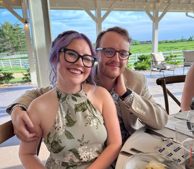 The author with her boyfriend Nate at Katie's wedding in 2024.