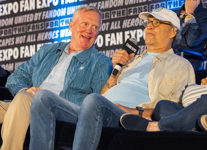 Anthony Michael Hall, left, and Chevy Chase at the “We’re Gonna Have the Hap-Hap-Happiest Fan Expo!” panel during Fan Expo Chicago 2025 on Aug. 17 in Rosemont, Illinois.