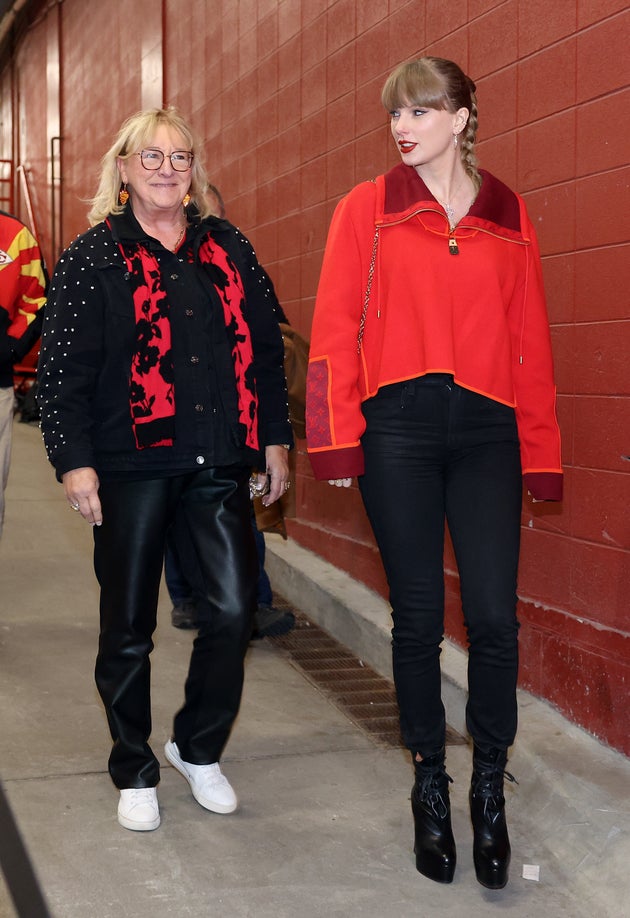Taylor Swift walks into a stadium alongside Donna Kelce prior to an NFL game in 2024.
