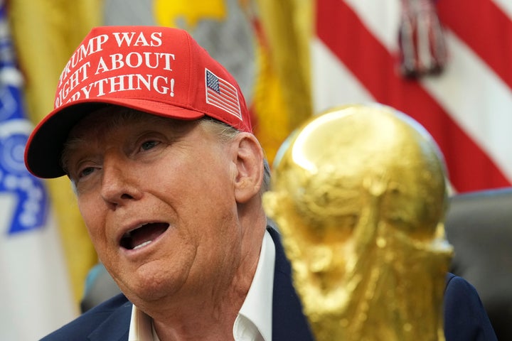 President Donald Trump, in Friday's photo at the Oval office, has the FIFA World Cup winners.