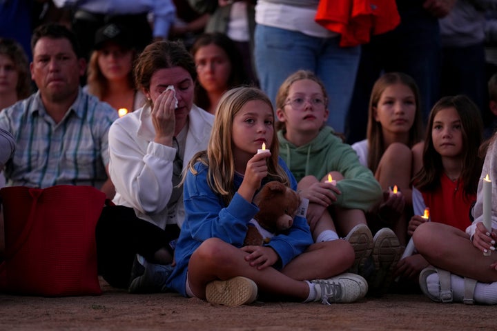 Mourners gather for a candlelight vigil to honor the victims and survivors of the shooting at Annunciation Catholic School in Minneapolis on Aug. 27, 2025. 