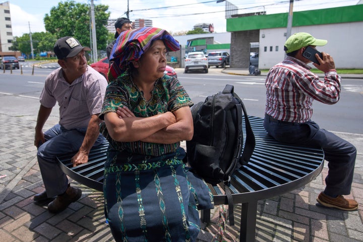People wait for loved ones from Guatemala deported from the United States outside La Aurora International Airport, in Guatemala City, on Aug. 31, 2025.