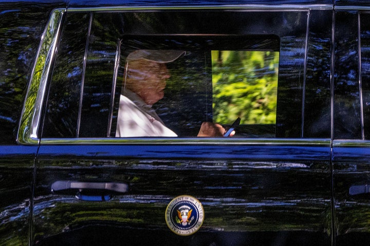 WASHINGTON, DC - AUGUST 31: U.S. President Donald Trump checks his phone on August 31, 2025 in Washington, DC. President Trump spent the day at Trump National Golf Club during the labor day weekend. (Photo by Tasos Katopodis/Getty Images)
