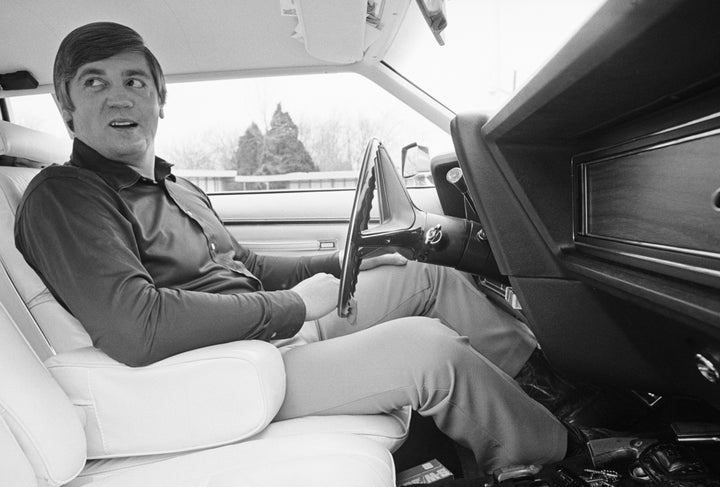This undated photograph shows former McNairy County Sheriff Buford Pusser sitting in his vehicle. 