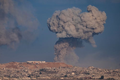 Israeli Strikes Kill At Least 31 In Gaza As International Scholars Accuse Israel Of Genocide