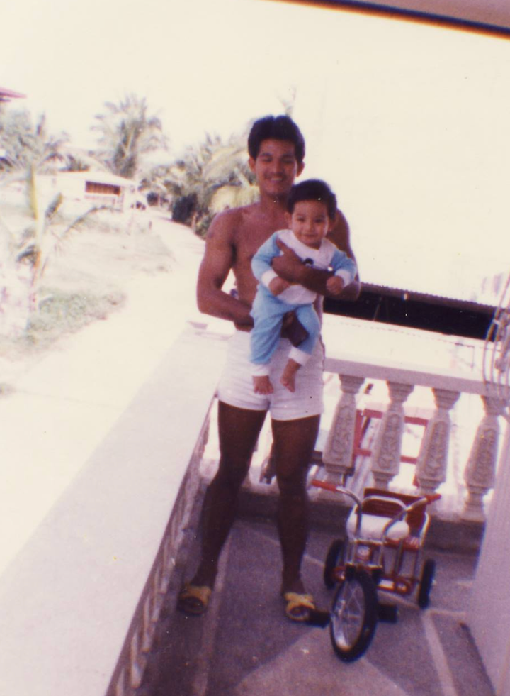 “This is my dad holding me on the balcony of the provincial home where he grew up, north of Manila,” the author writes. “He and my mom had me in their early 20s. This is a snapshot from the good old days, when life felt wide open.”